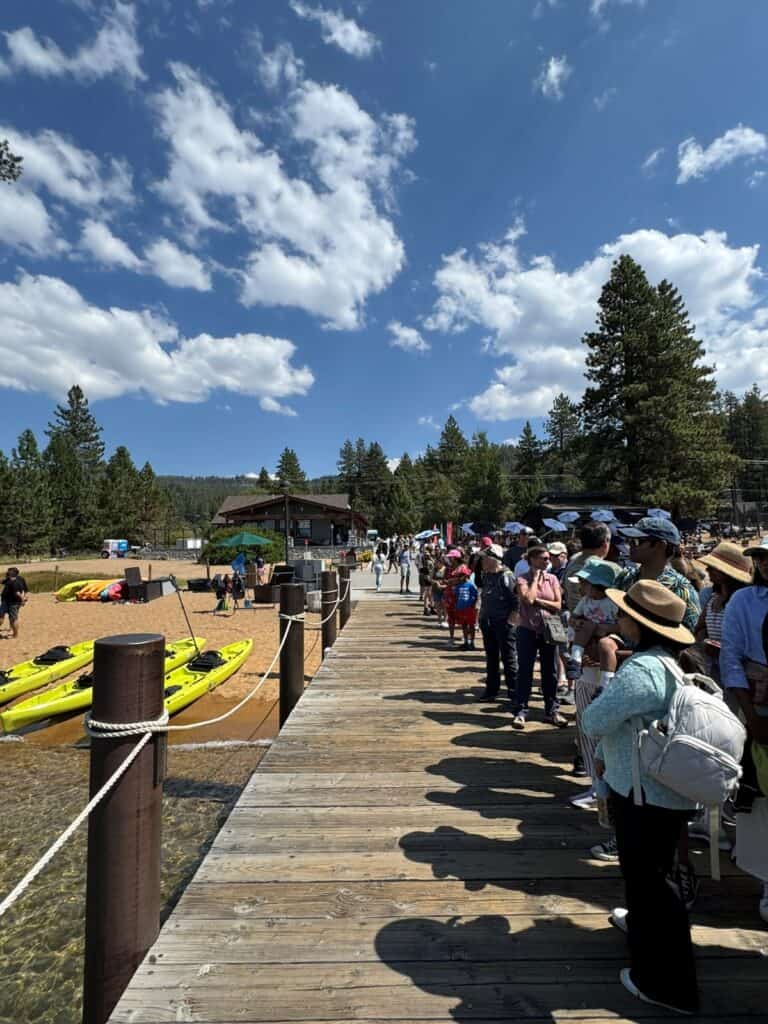 Passengers lining up at the boardwalk before boarding